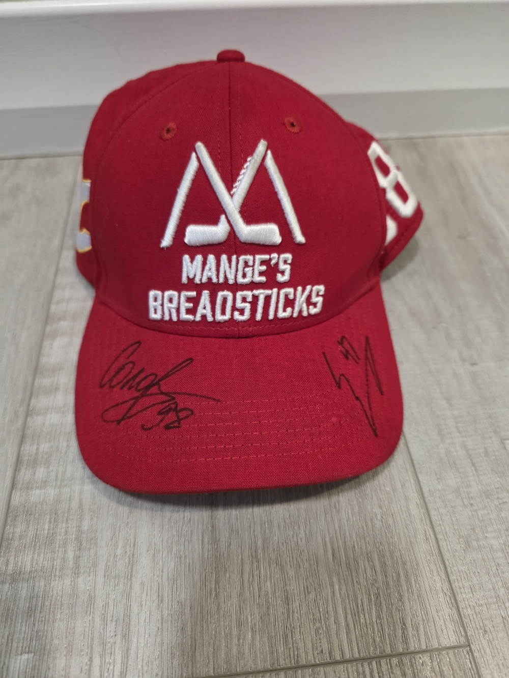 Mange’s Breadsticks Calgary Flames Signed Snapback Hat #88 Red Hockey Cap